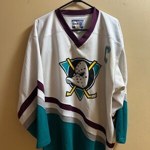 Vintage Hockey Jersey with Teal and Maroon Accents